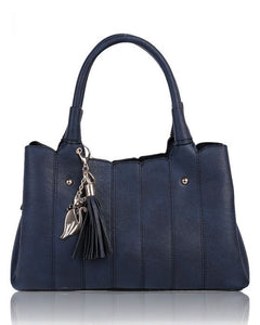 Top handle handbag with cat & tassel charms